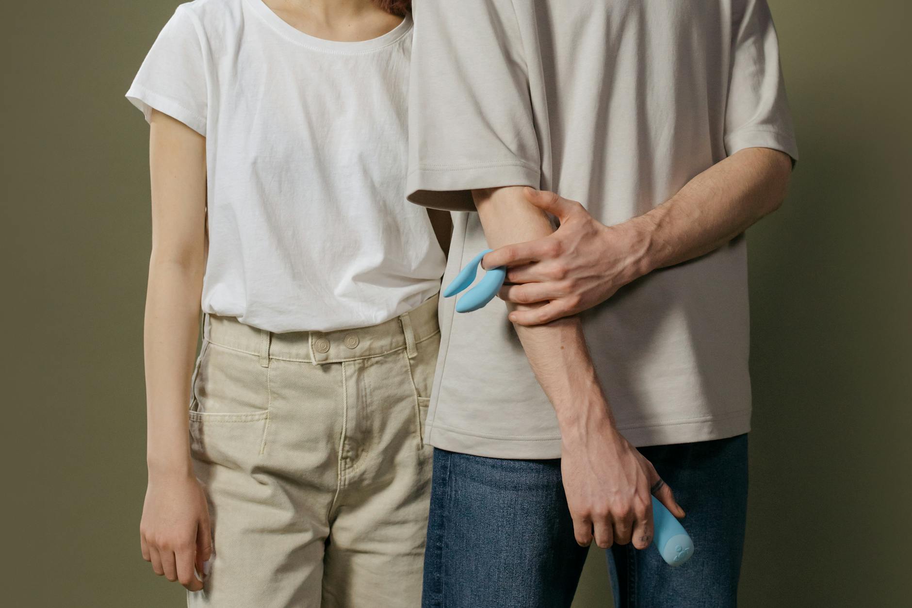 A mature couple exploring intimacy together with a modern clitoral vibrator